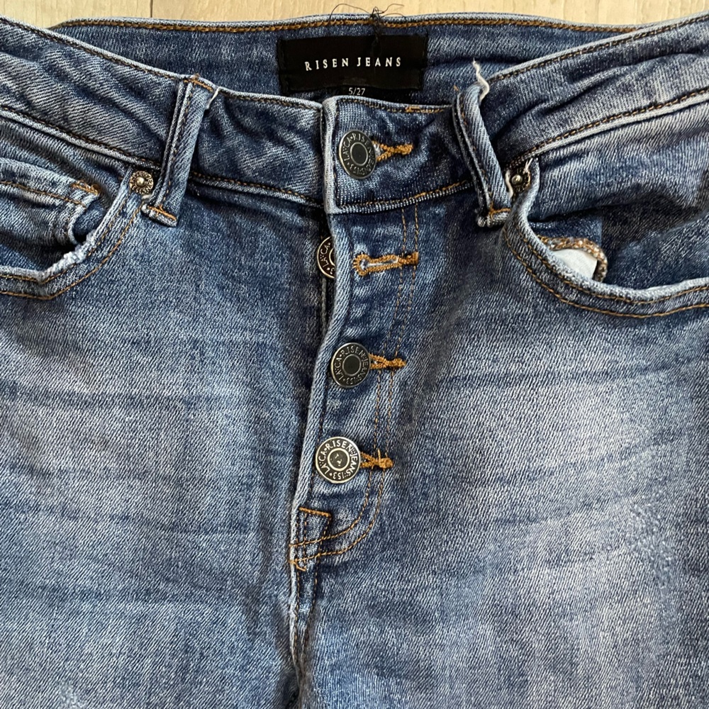 Risen fly button skinny jeans with fringed ankles, size 5